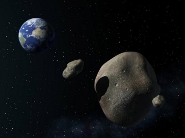 Vue d'artiste de l'astéroïde 2005-YU55 (image NASA)